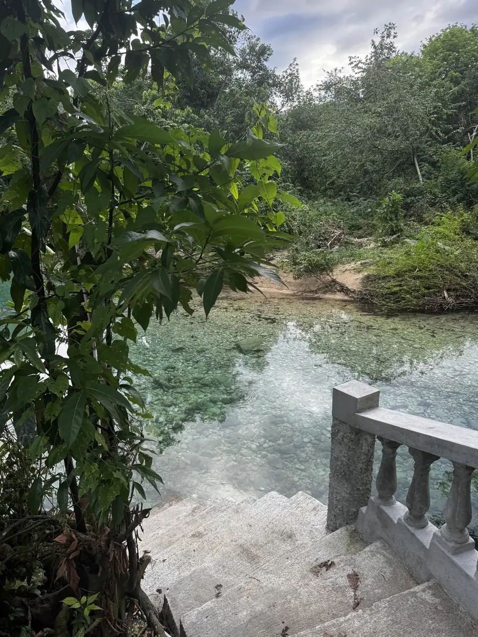 Stone steps leading from River’s Edge to the clear Reach River