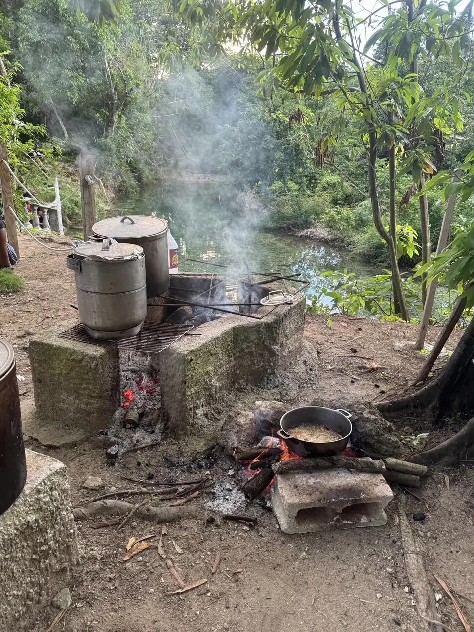 Traditional Jamaican riverside cooking beside the river