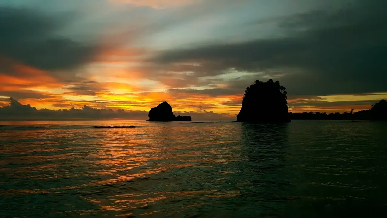 Sunrise over the Caribbean sea beside Turtle Bay