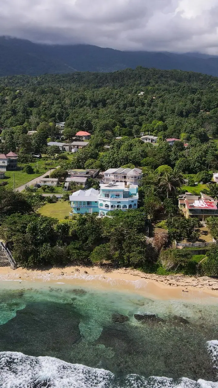 Aerial view of Serendipity, Turtle Bay and the surrounding mountains