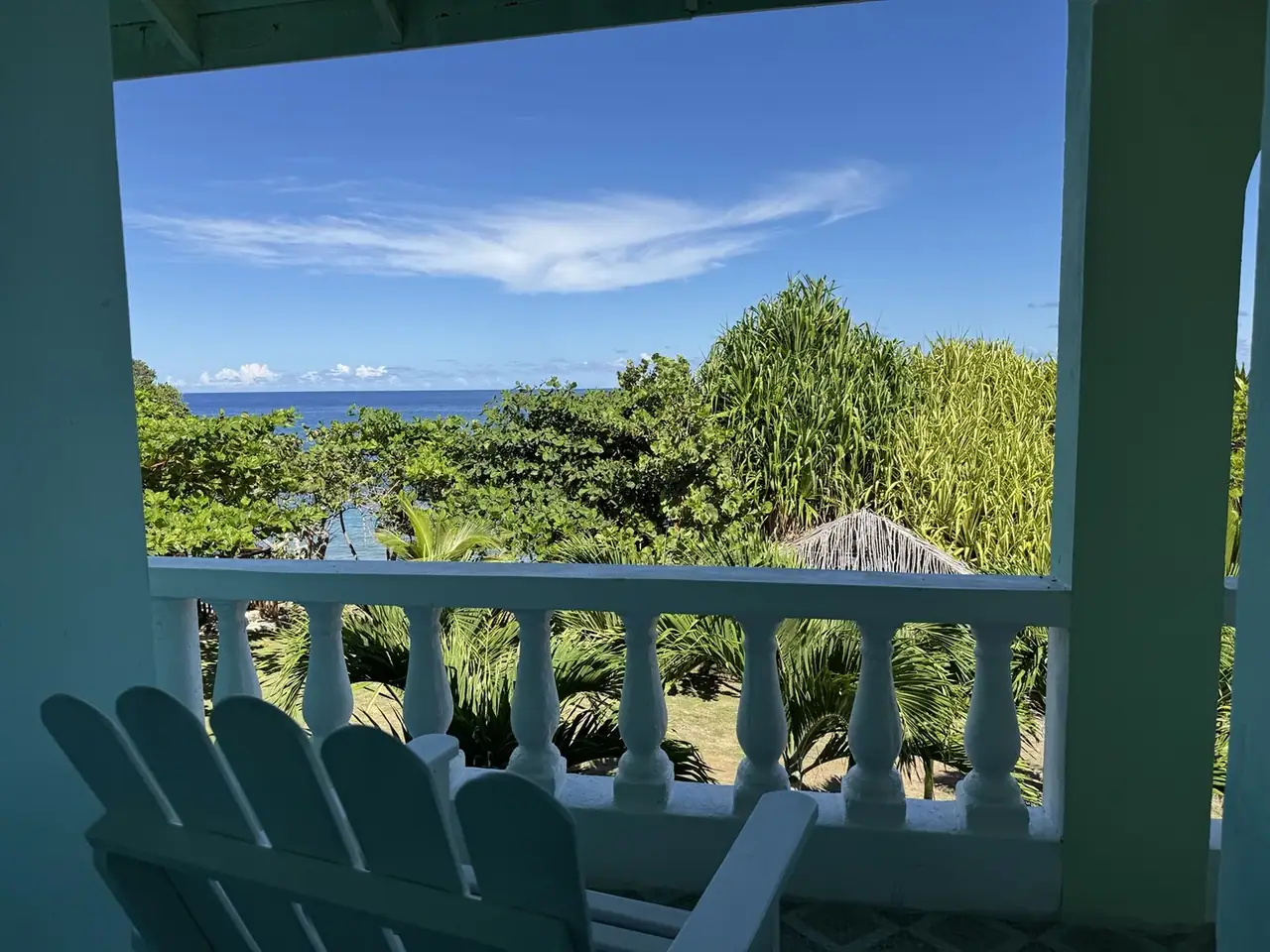 Serendipity villa veranda looking toward the ocean and green gardens